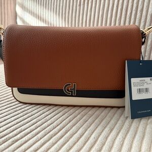 Cole Haan Brown and Black Crossbody Bag with Modern Design